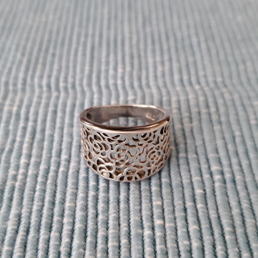 Wide sterling silver ring.